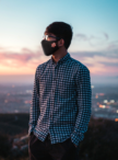 face-mask-mockup-featuring-a-man-and-a-landscape-in-the-background-4663-el1
